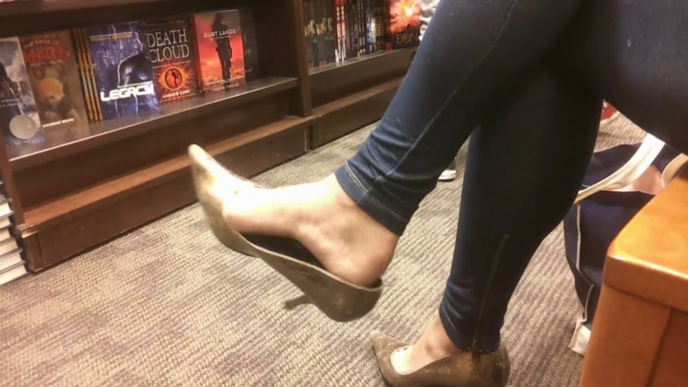 Candid Girl in the library extremely Dangling her heels