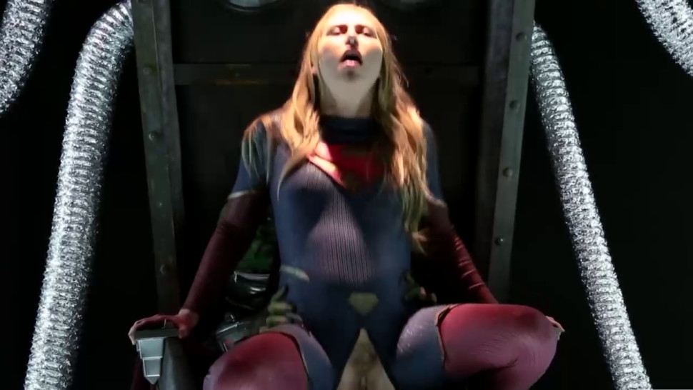 The blonde SuperGirl and a green monster drilling her h